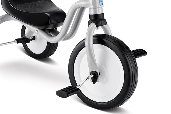 Laat uw kindje oefenen met de trappers.