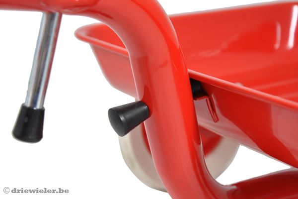 Vergrendeling voor de kiepbak.